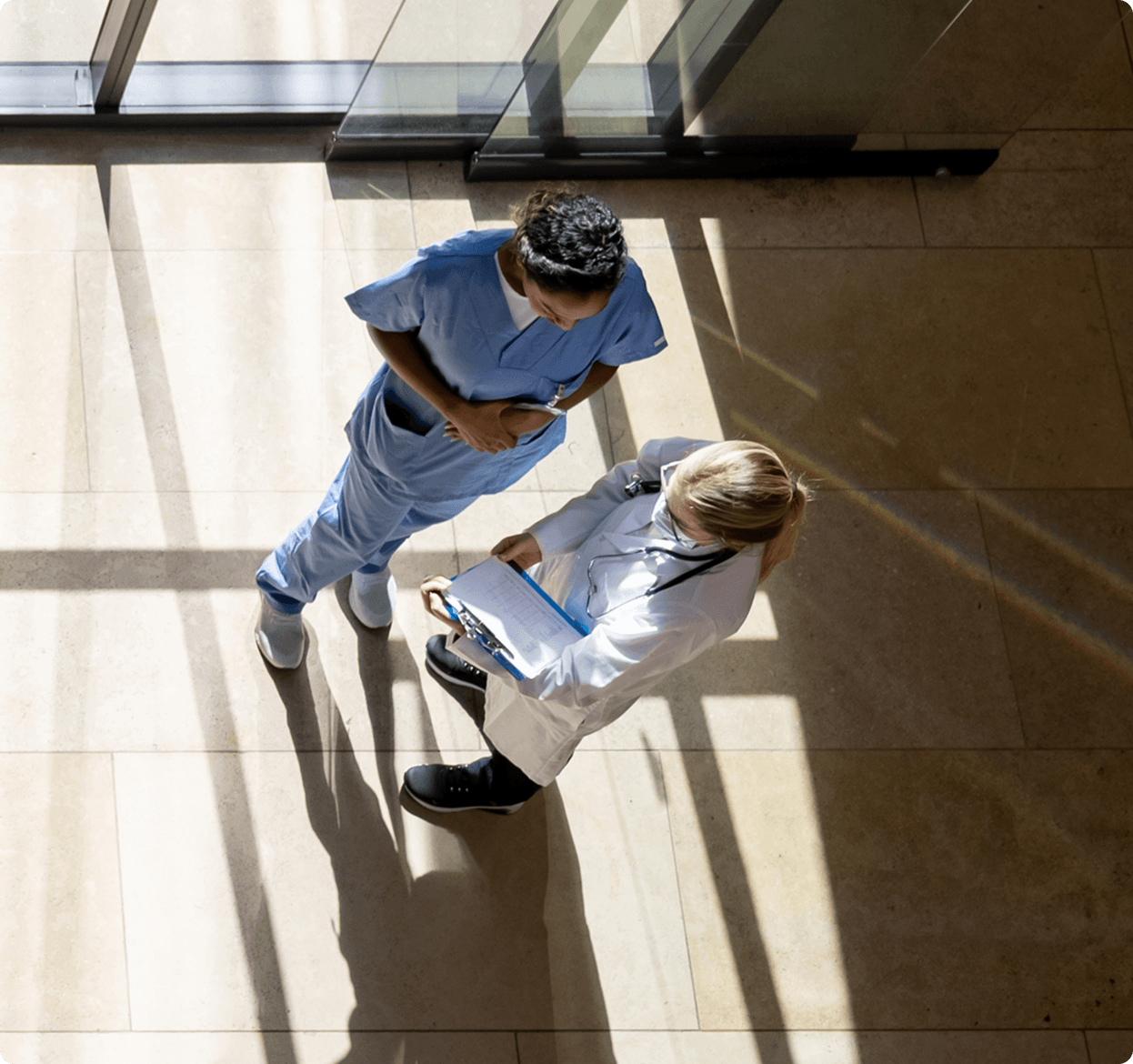 Birds eye view of two doctors in coversation